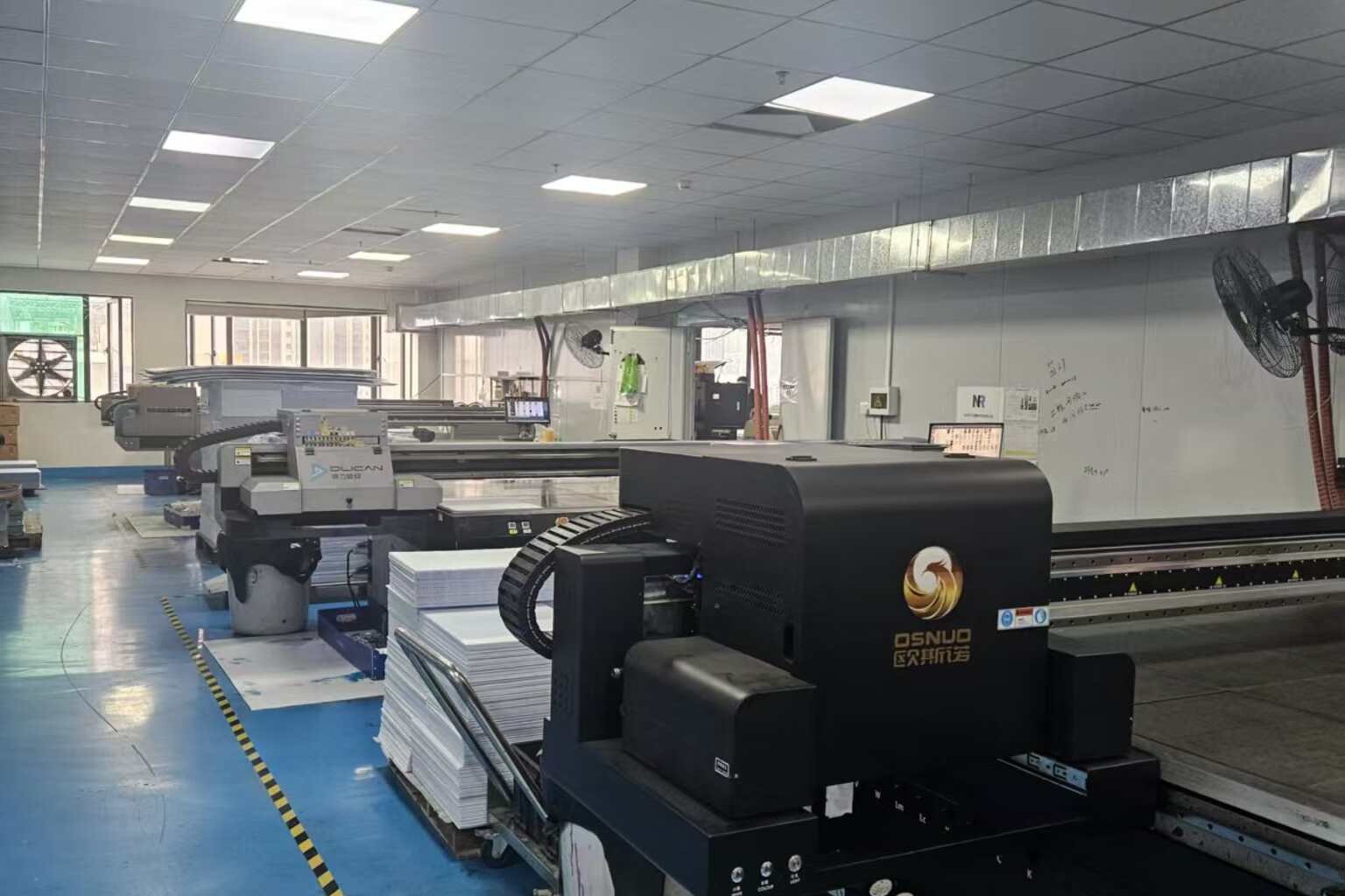 Commercial printing machines producing corrugated plastic sheets for bulk custom yard signs